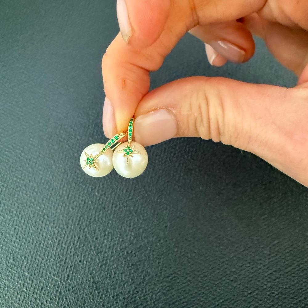 Sydney Evan’s pearl bead starburst earring with emeralds